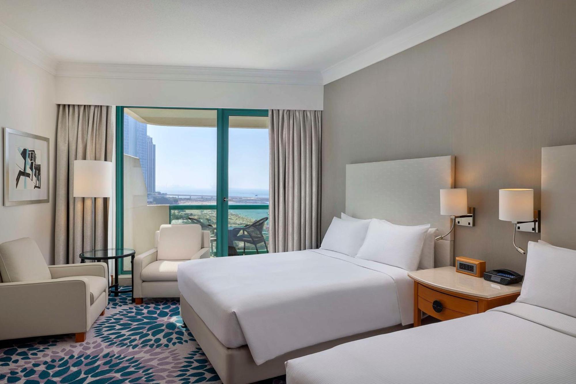 Family Suite Two Queen Beds Partial Sea View