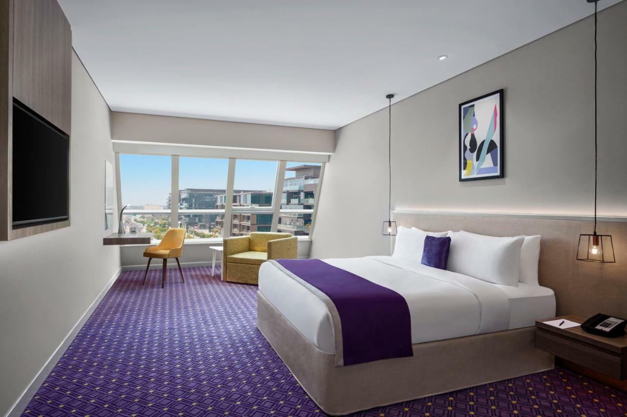 Quarto Premium com Cama King-size e Vista da Cidade