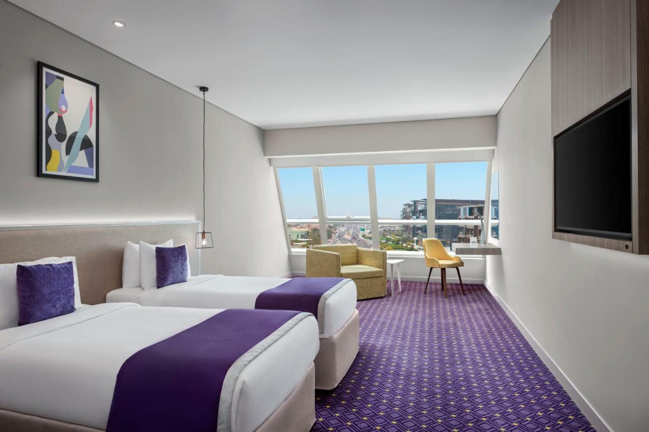 Quarto Premium com 2 Camas de Solteiro e Vista da Cidade
